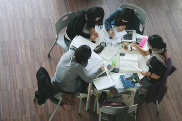 Students working together in an English class